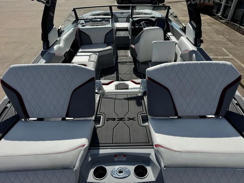 Slide: The Image of Interior of 2023 Tigé 22RZX boat with luxurious seating and modern design. - 9