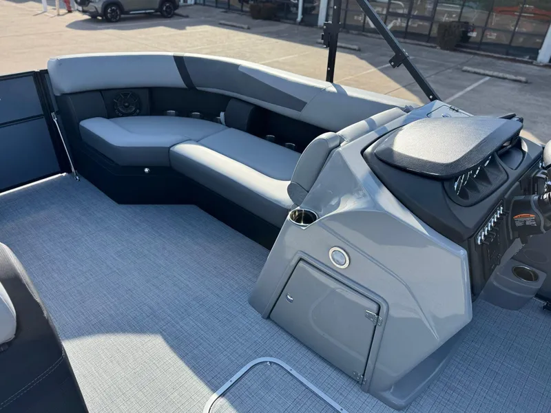 Slide: The Image of 2025 Trifecta 24RF CS 3.0 boat interior with sleek seating and modern dashboard. - 2