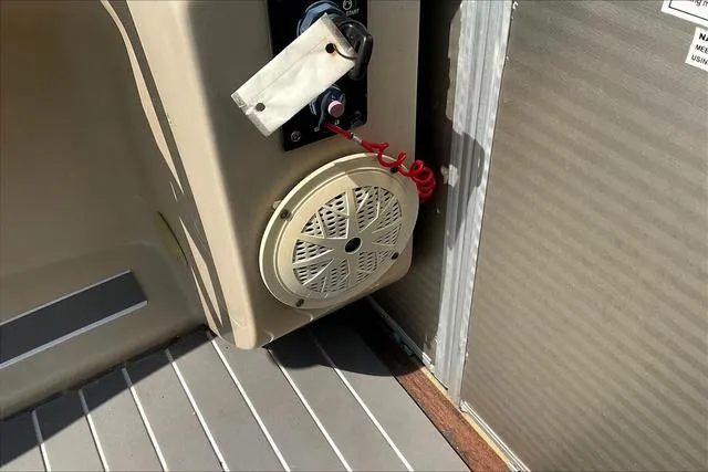 Slide: The Image of 2016 Sweetwater SW 2286 boat interior with speaker and control panel. - 19