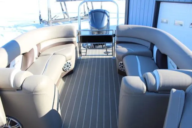Slide: The Image of 2019 Sylvan S3 boat interior with plush seating and modern design. - 10