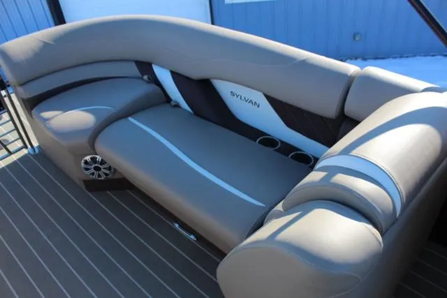 Slide: The Image of 2019 Sylvan S3 boat interior with gray seating and cup holders. - 11