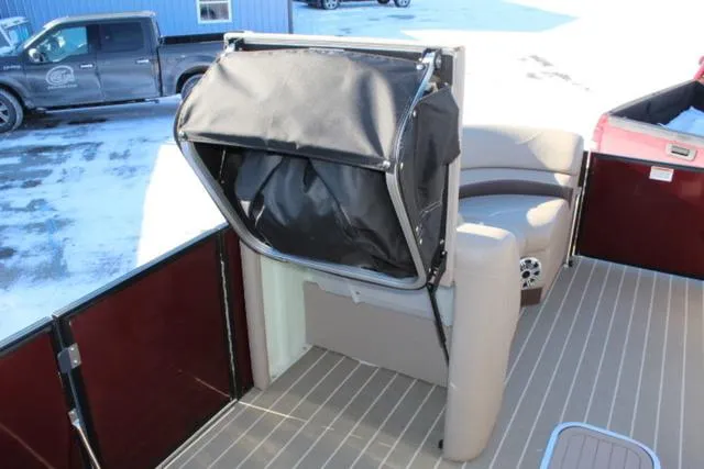 Slide: The Image of 2019 Sylvan S3 boat interior with foldable seat and storage compartment. - 18