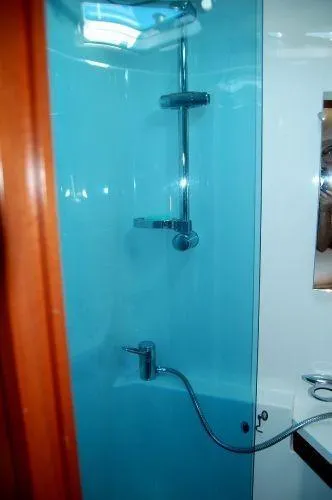 Slide: The Image of Shower area in 2008 Beneteau Oceanis 49 yacht with blue glass panel. - 13