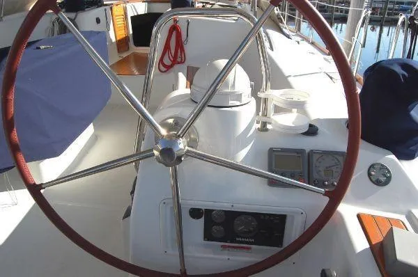 Slide: The Image of Steering wheel and cockpit of 2008 Beneteau Oceanis 49 sailboat. - 3
