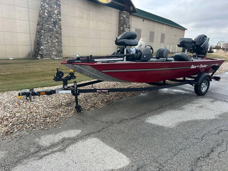 Slide: The Image of 2025 Tracker Bass Tracker Classic XL boat on trailer, parked outdoors. - 8