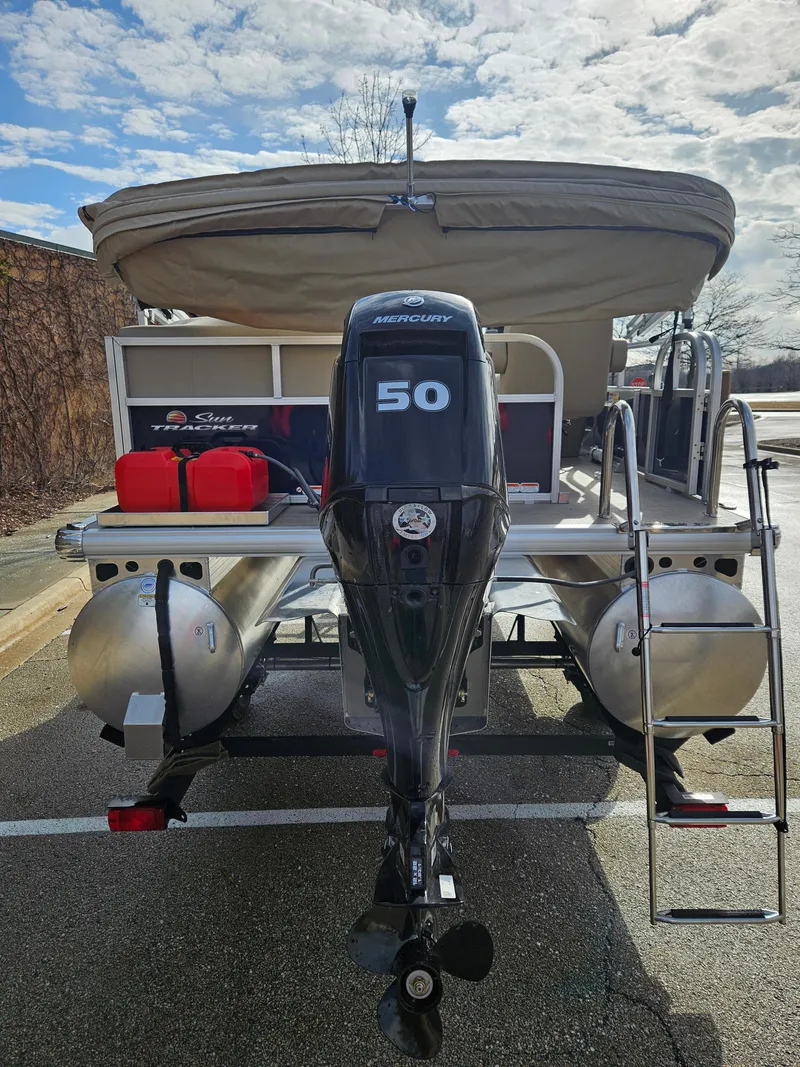 Slide: The Image of 2025 Sun Tracker Bass Buggy 16 XL Select pontoon boat with 50 HP motor. - 5