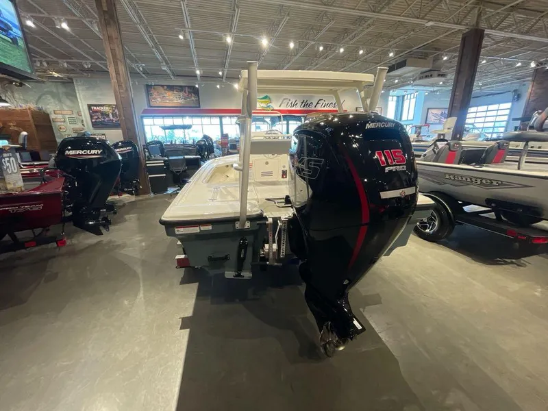 Slide: The Image of 2025 Mako 18 LTS boat with Mercury 115 Pro XS engine in showroom. - 5