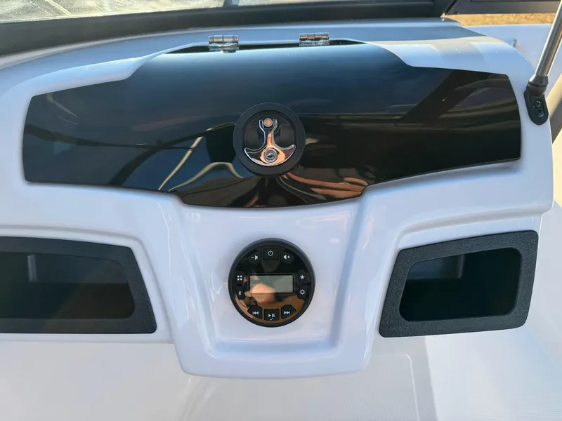 Slide: The Image of Dashboard of 2025 Tahoe 200 S boat with modern controls and sleek design. - 4