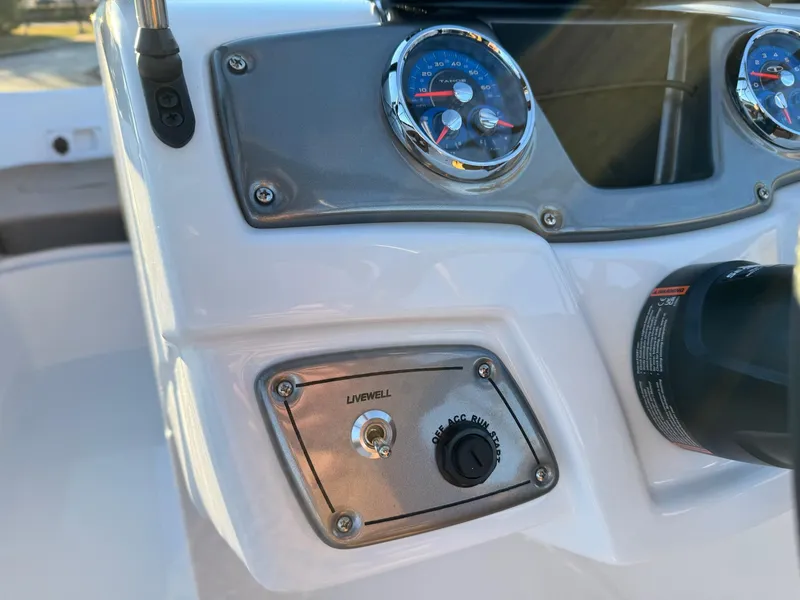 Slide: The Image of Dashboard of 2025 Tahoe 200 S boat with gauges and controls. - 5