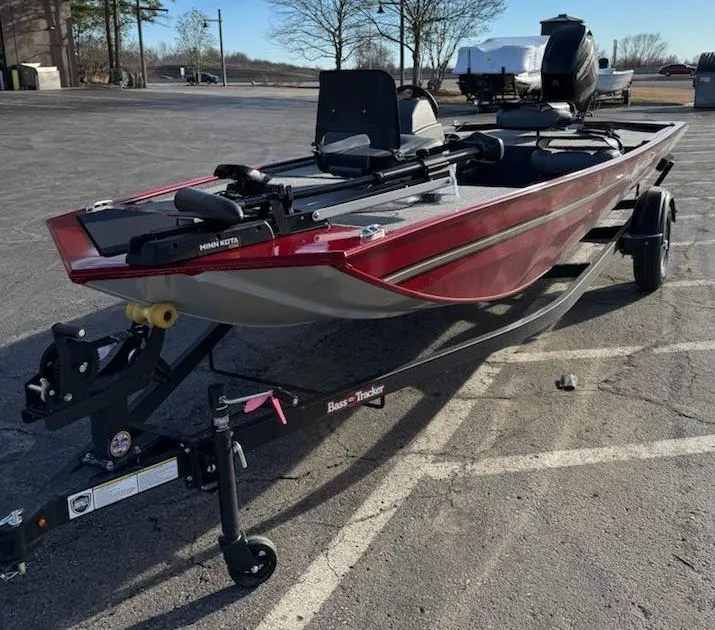 Slide: The Image of 2025 Tracker Bass Tracker Classic XL boat on trailer in parking lot. - 4