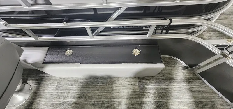 Slide: The Image of 2025 Ranger Reata 220F boat interior with sleek railing and modern flooring design. - 11