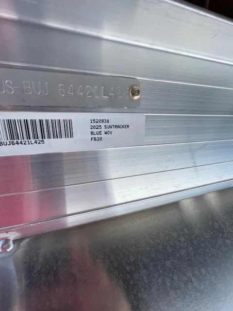 Slide: The Image of 2025 Sun Tracker Fishin' Barge 20 DLX identification plate with barcode and serial number. - 6