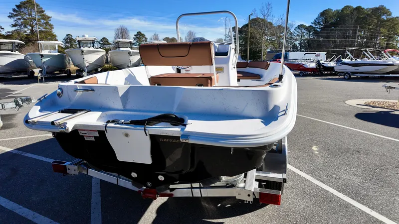 Slide: The Image of 2025 ALK2 Powerboats 18 CRS on trailer in parking lot, rear view. - 3