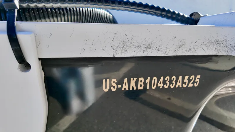 Slide: The Image of 2025 ALK2 Powerboats 18 CRS with visible hull identification number. - 7