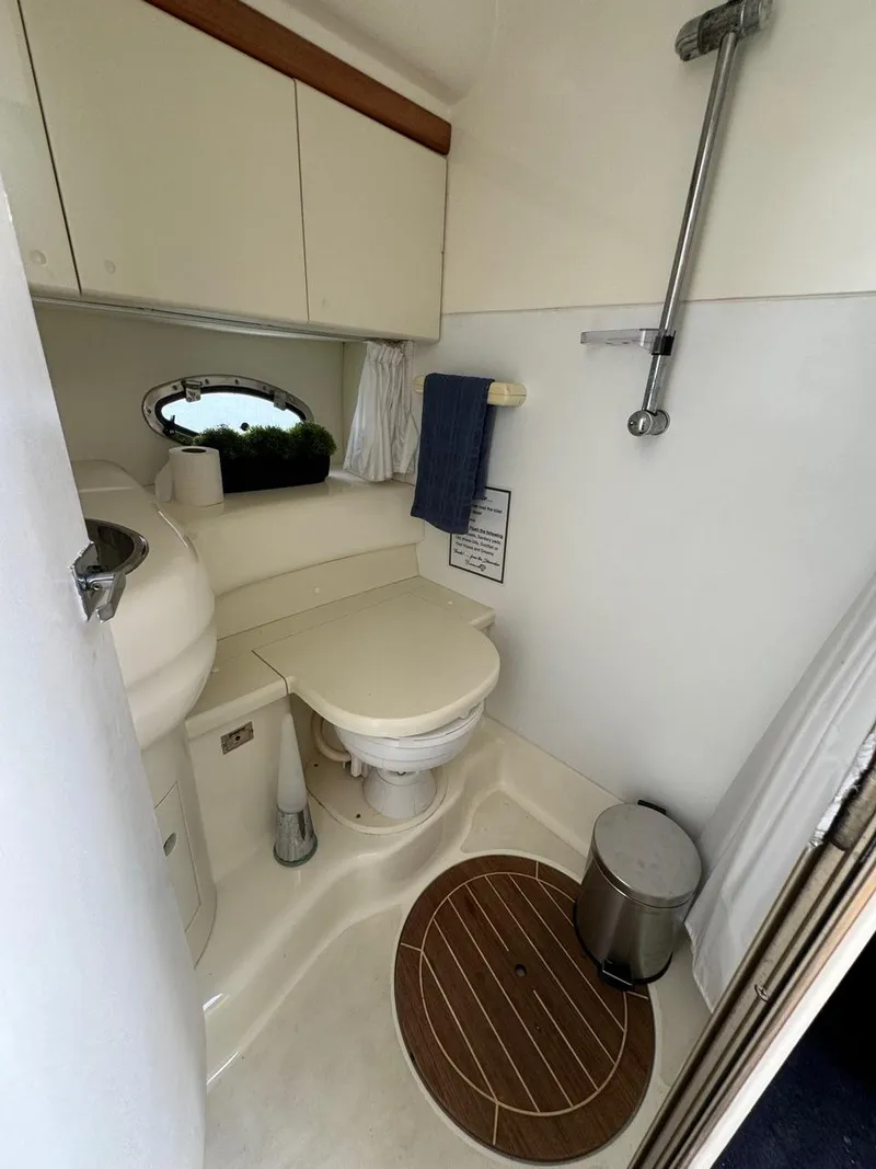 Slide: The Image of Bathroom interior of 2003 Cranchi Endurance 39 yacht, featuring toilet and shower. - 9