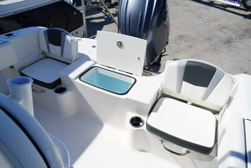 Slide: The Image of 2025 Robalo R200 boat interior with seating and storage compartment. - 14