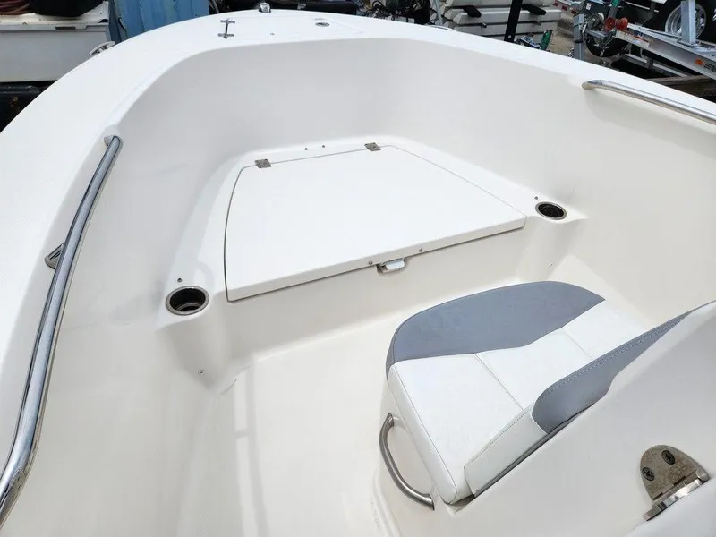 Slide: The Image of 2020 Robalo R180 boat interior with seating and storage compartment. - 8