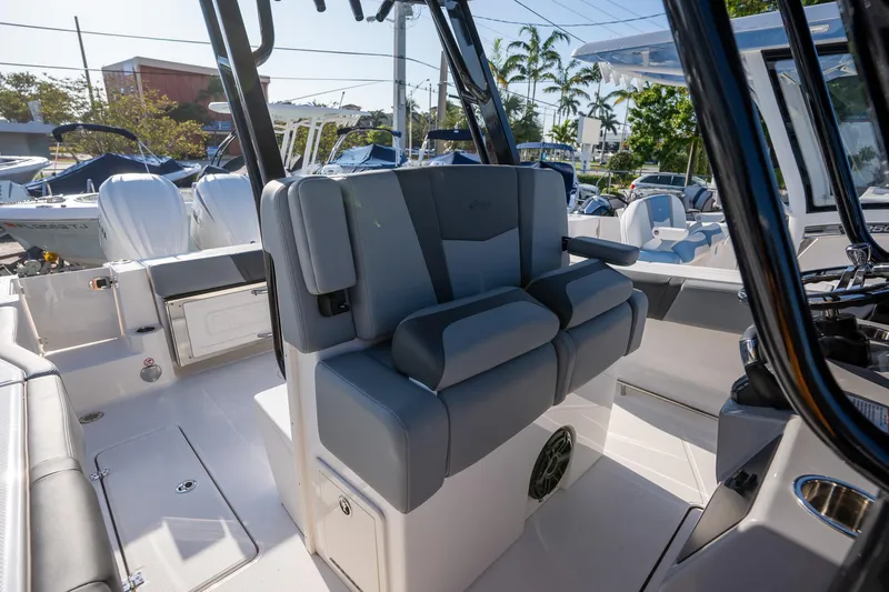 Slide: The Image of 2025 Robalo R270 boat interior with dual seating and modern design. - 11