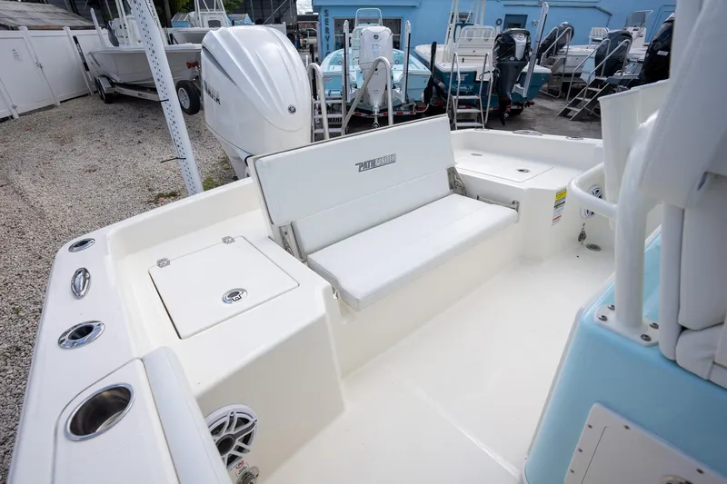 Slide: The Image of 2025 Pathfinder 2400 TRS boat interior with seating and storage compartments. - 15