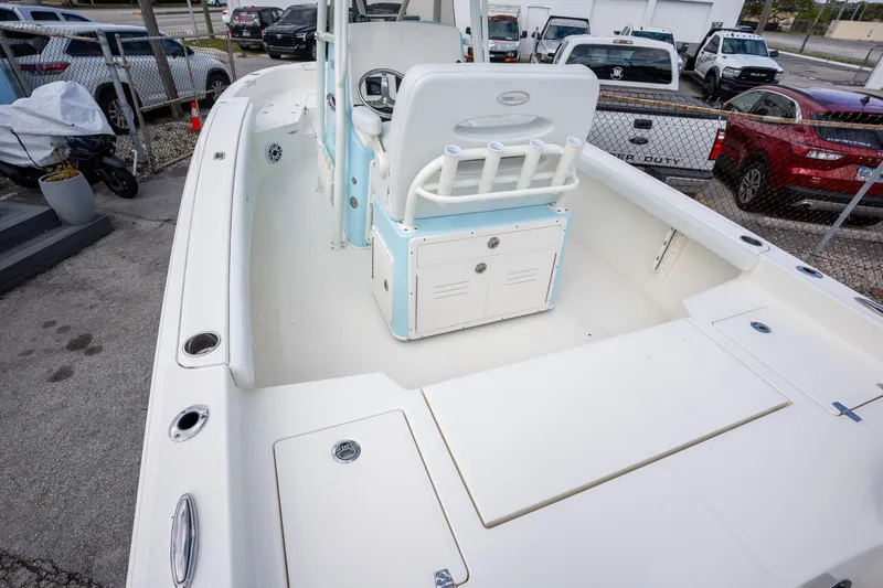 Slide: The Image of 2025 Pathfinder 2400 TRS boat interior with seating and storage compartments. - 6