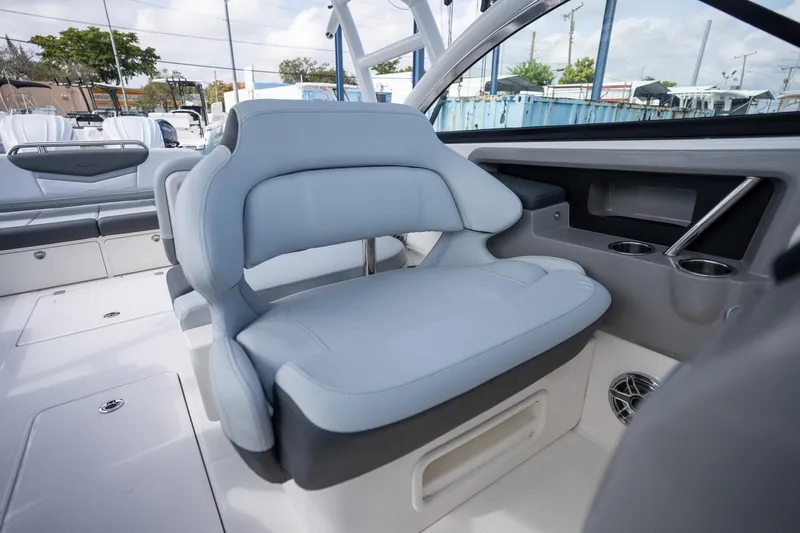Slide: The Image of 2025 Robalo R317 boat interior with luxurious seating and modern design features. - 10