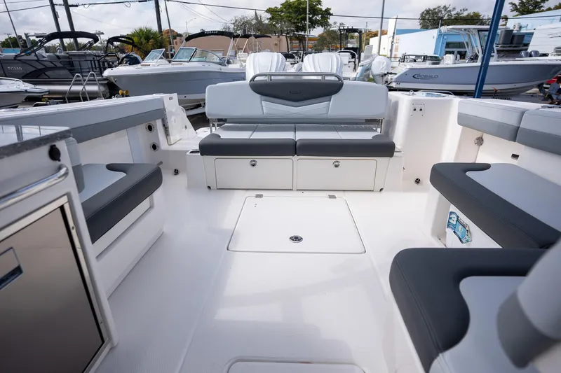 Slide: The Image of 2025 Robalo R317 boat interior with spacious seating and modern design. - 12