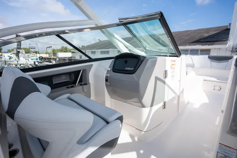 Slide: The Image of 2025 Robalo R317 boat interior with modern helm and seating. - 4
