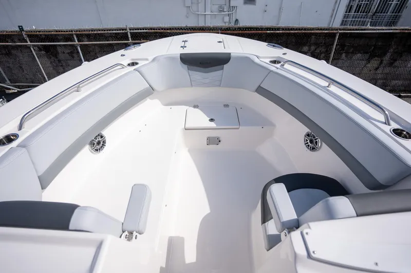 Slide: The Image of 2025 Robalo R317 boat interior with spacious seating and modern design. - 5