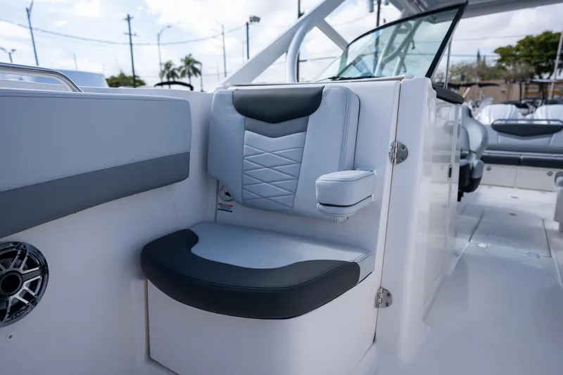 Slide: The Image of 2025 Robalo R317 boat interior seating with modern design and comfortable upholstery. - 7