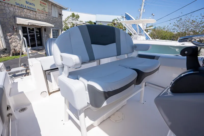 Slide: The Image of 2025 Robalo R230 boat interior with dual seating and modern design. - 12