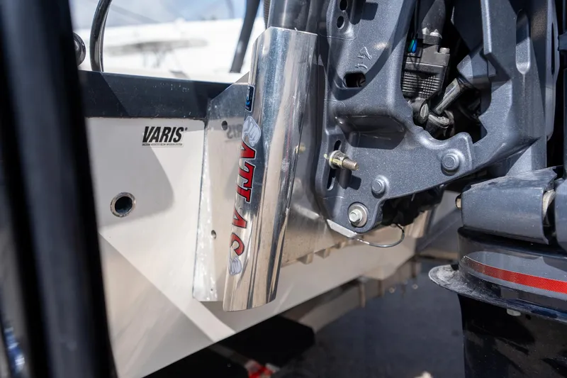 Slide: The Image of Close-up of 2025 Hewes Redfisher 18 boat engine components, featuring Atlas and Varis branding. - 10