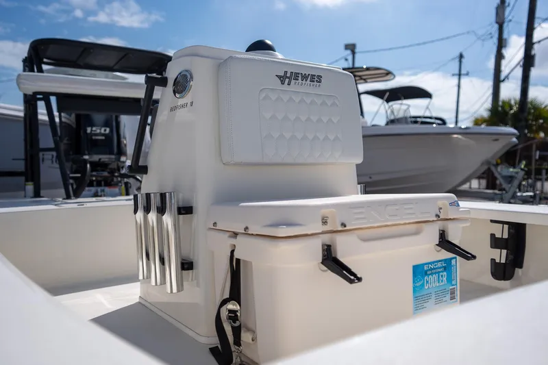 Slide: The Image of 2025 Hewes Redfisher 18 boat interior with Engel cooler and rod holders. - 4