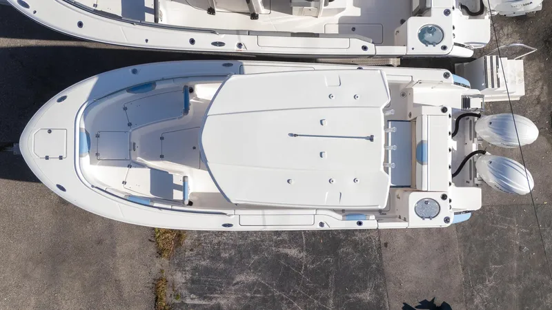 Slide: The Image of Aerial view of 2025 Robalo R250 boat, showcasing sleek design and spacious deck layout. - 6
