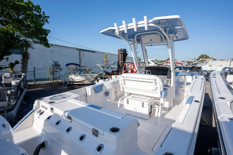 Slide: The Image of 2025 Robalo R250 boat with sleek design, spacious deck, and modern features. - 7