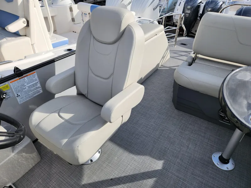 Slide: The Image of 2023 Sylvan X5 boat interior with plush seating and modern design. - 17