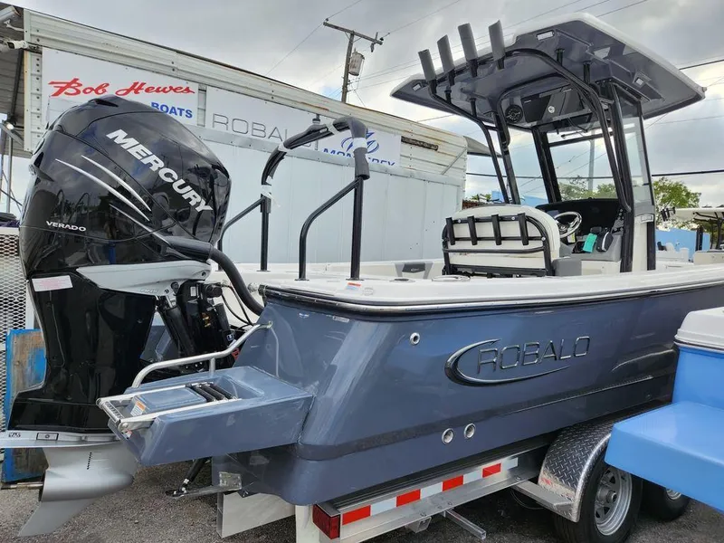 Slide: The Image of 2023 Robalo 266 Cayman boat with Mercury Verado engine at dealership. - 3