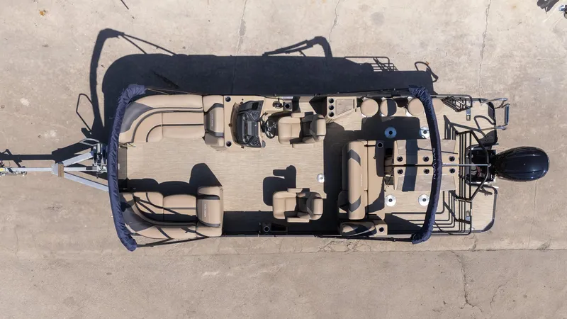 Slide: The Image of 2024 Sylvan L3 DLZ Bar pontoon boat, aerial view, showcasing spacious seating and modern design. - 4