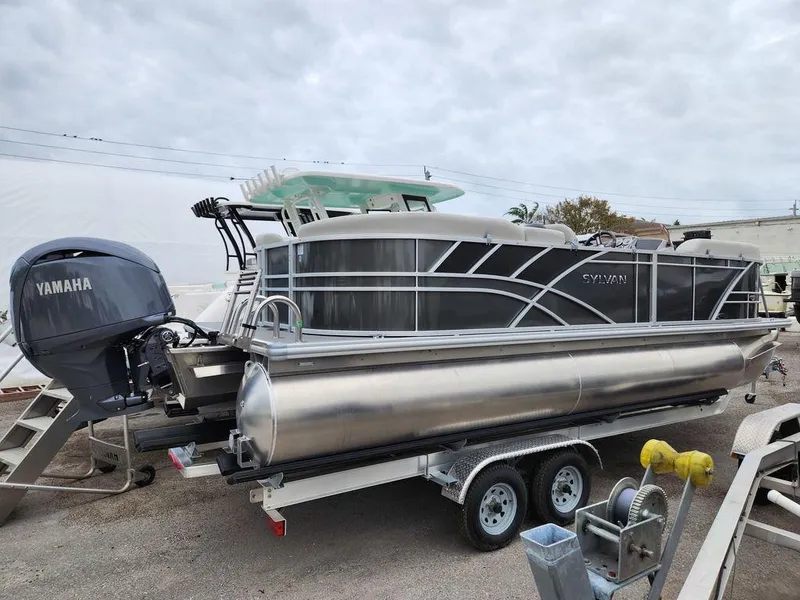 Slide: The Image of 2024 Sylvan 822 LZ pontoon boat with Yamaha engine on trailer. - 15