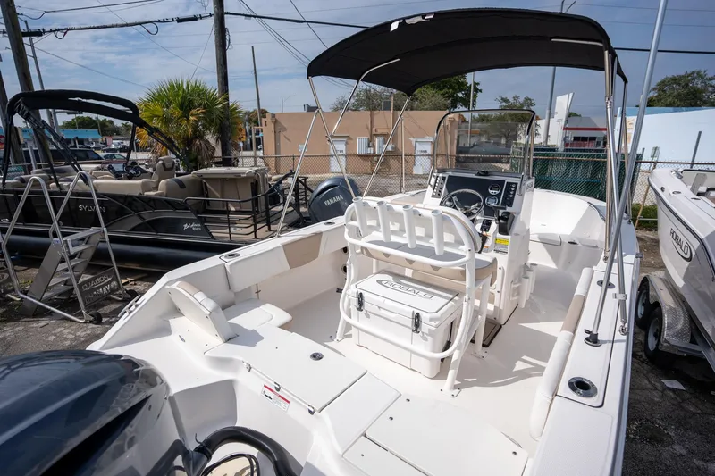 Slide: The Image of 2024 Robalo R180 boat with Yamaha engine, featuring spacious deck and modern controls. - 5