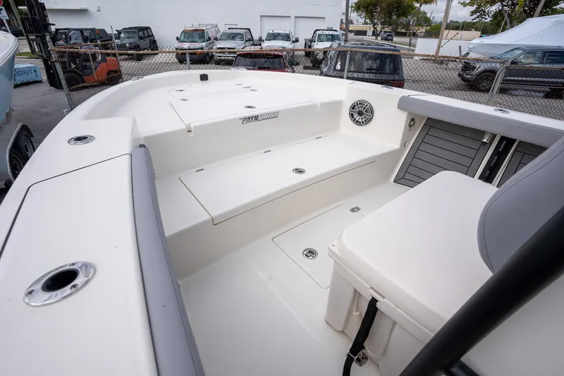 Slide: The Image of 2025 Pathfinder 2400 Open boat interior with seating and storage compartments. - 10