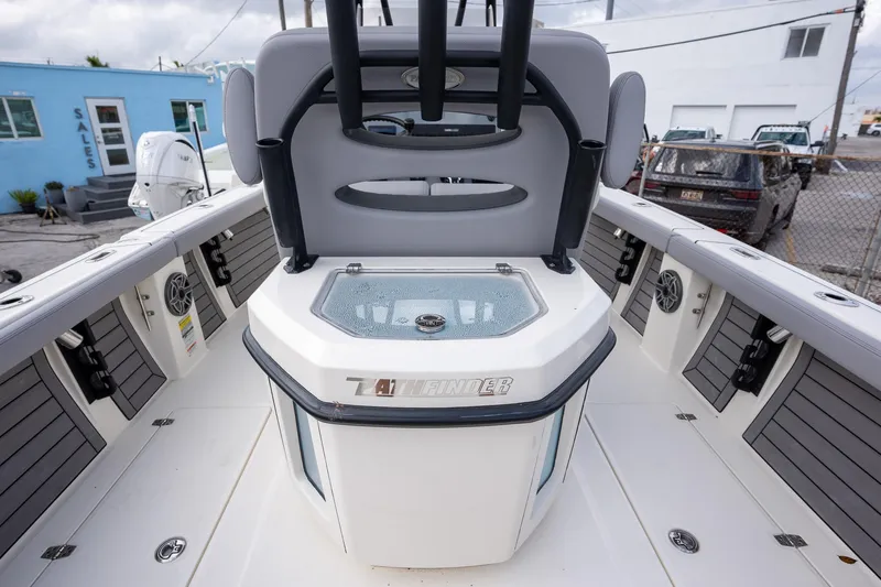 Slide: The Image of 2025 Pathfinder 2400 Open boat interior with seating and storage compartments. - 15
