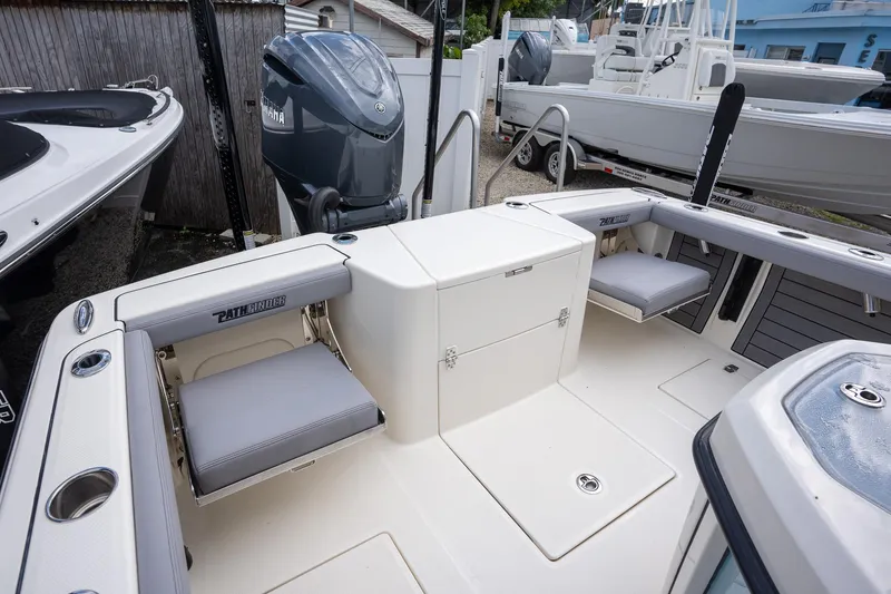 Slide: The Image of 2025 Pathfinder 2400 Open boat interior with seating and storage compartments. - 5