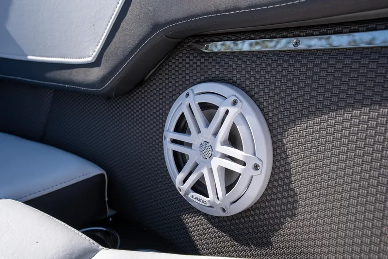 Slide: The Image of 2023 Monterey 275SS boat interior with stylish speaker and textured paneling. - 17