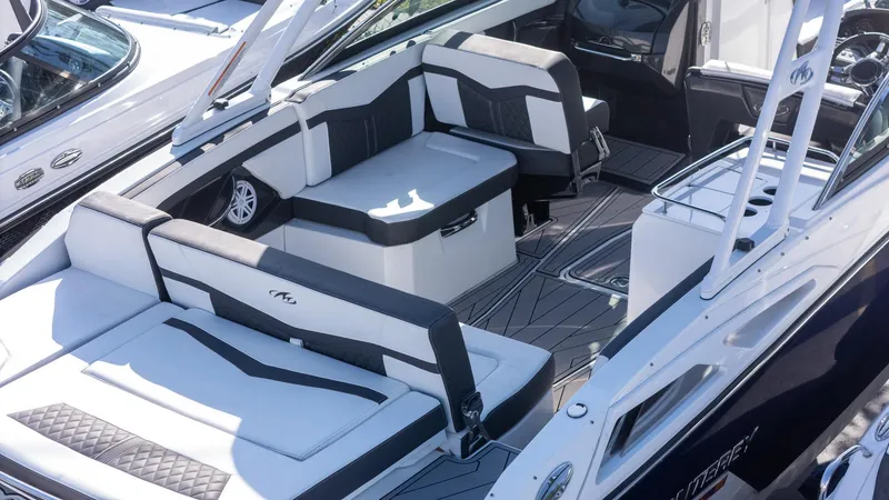 Slide: The Image of 2023 Monterey 275SS boat interior with sleek seating and modern design. - 7