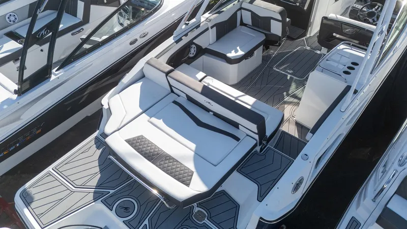 Slide: The Image of 2023 Monterey 275SS boat interior with sleek seating and modern design. - 9