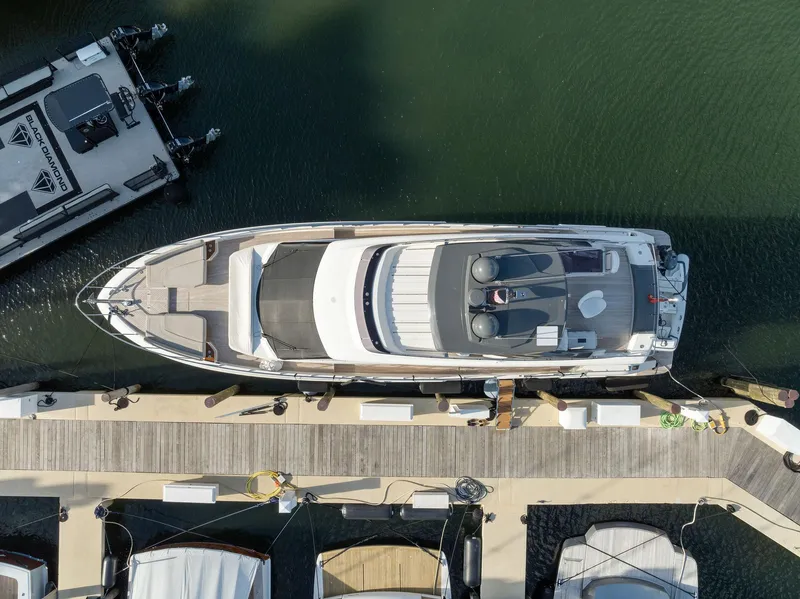 Slide: The Image of Aerial view of 2020 Ferretti Yachts 670 docked at a marina. - 11