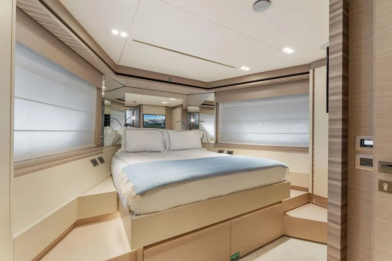 Slide: The Image of Luxurious bedroom interior of 2020 Ferretti Yachts 670, featuring modern design and cozy ambiance. - 45