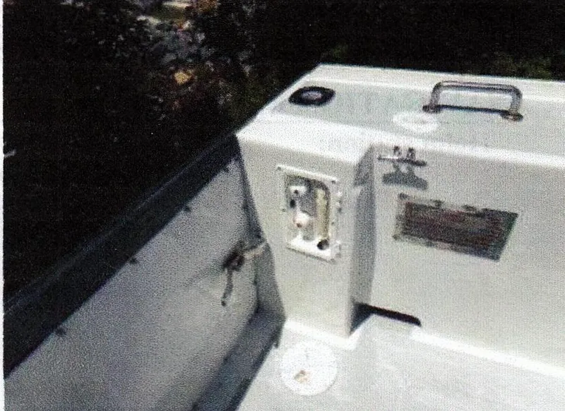 Slide: The Image of 1999 Custom 30 Novi Hardtop Cruiser interior detail with control panel and handle. - 12