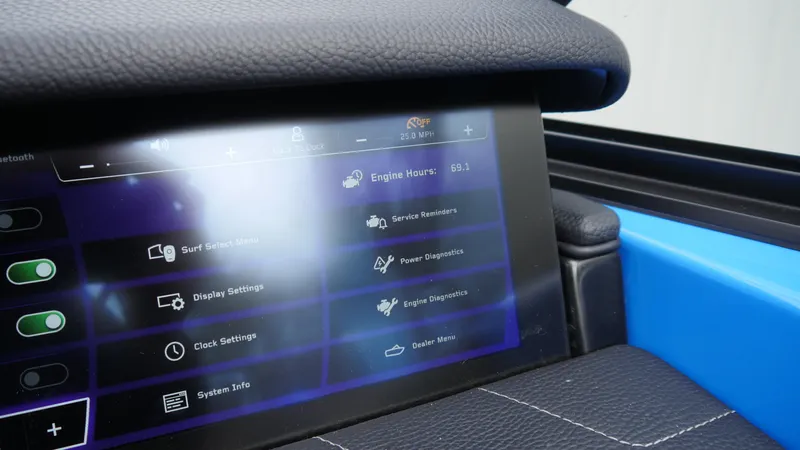 Slide: The Image of 2023 Nautique Super Air G23 dashboard touchscreen displaying various control settings. - 11