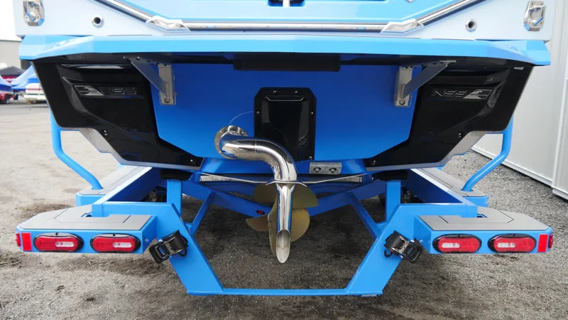 Slide: The Image of 2023 Nautique Super Air G23 boat stern with propeller and exhaust system. - 6